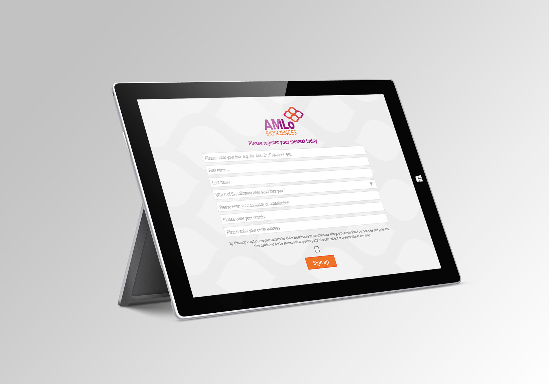 Mockup of Surface Tablet with branded AMLo sign-up form for conference and exhibition data capture