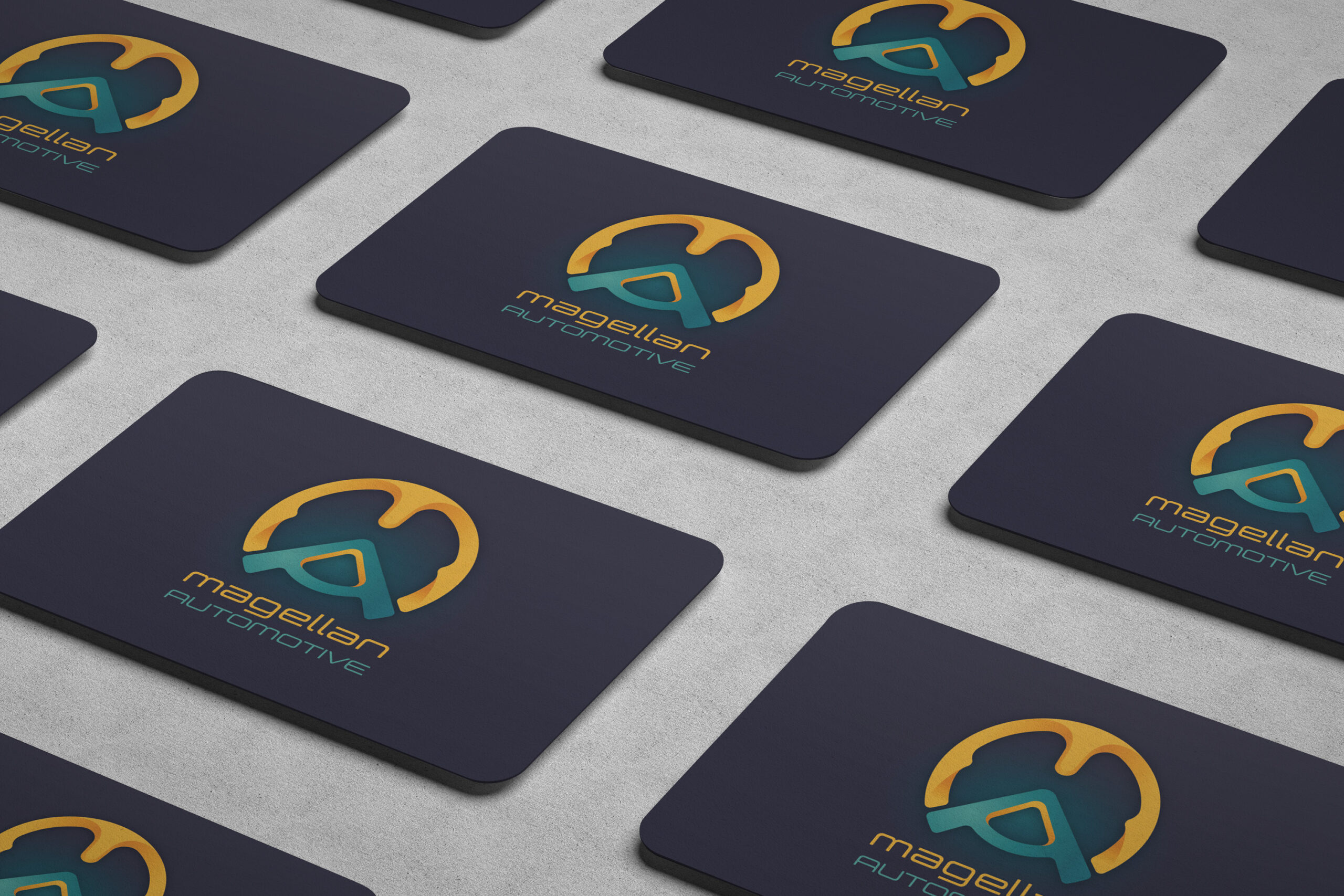 Magellan Automotive business cards Magellan Automotive business cards set out in a pattern