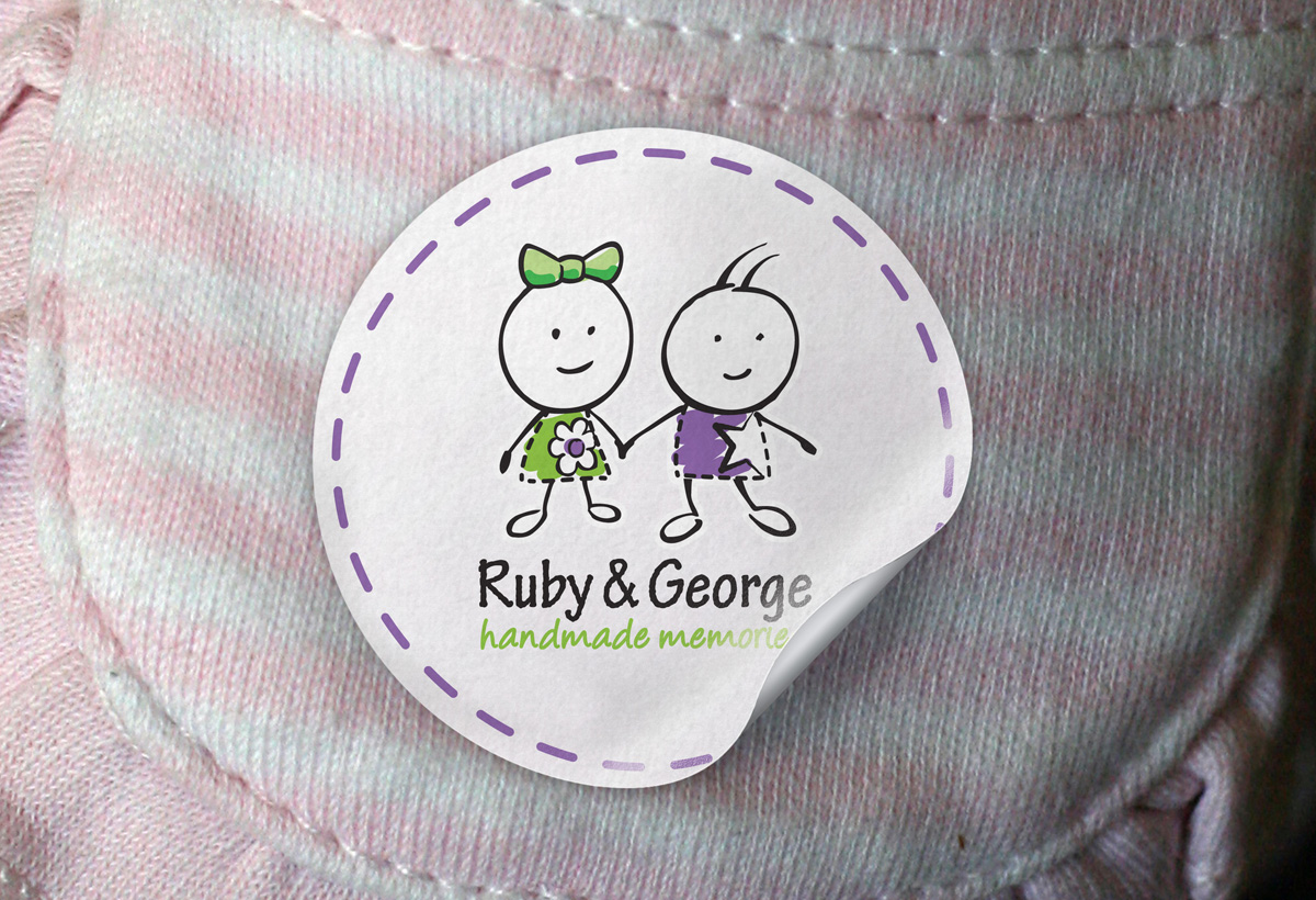 Round Ruby & George sticker applied to completed teddy bear